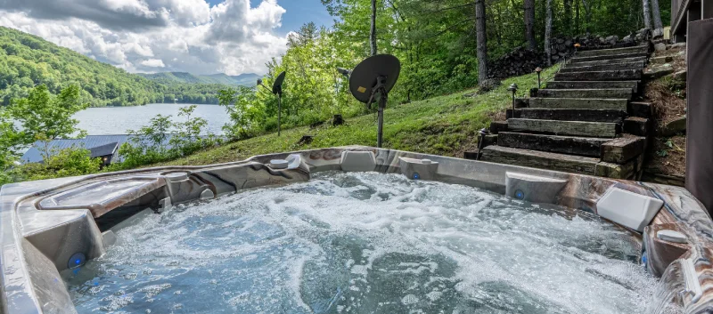 Relaxing in a hot tub with a lake view